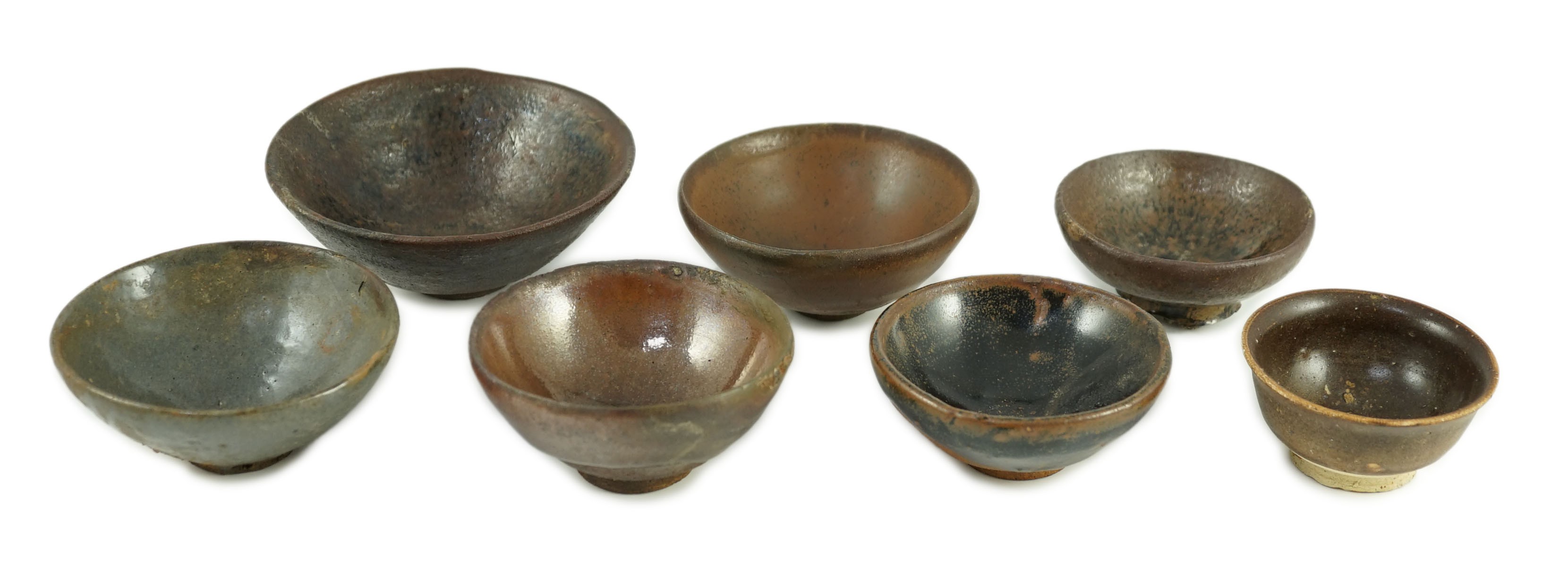 A group of Chinese Jian ware tea bowls, Song dynasty, largest 11.5 cms diameter, 7cm to 11.4cm diameter